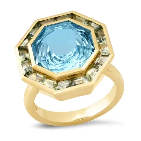 14K YG Sky Blue Topaz and Tsavorite Bia Ring