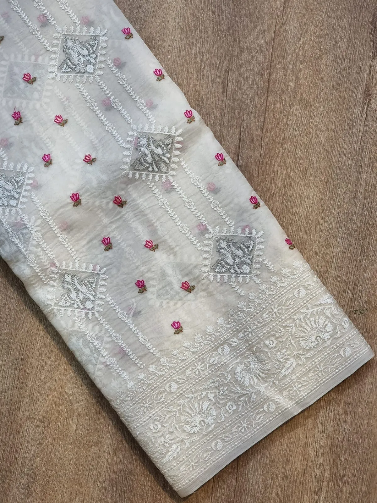 Embroidered white organza silk sarees