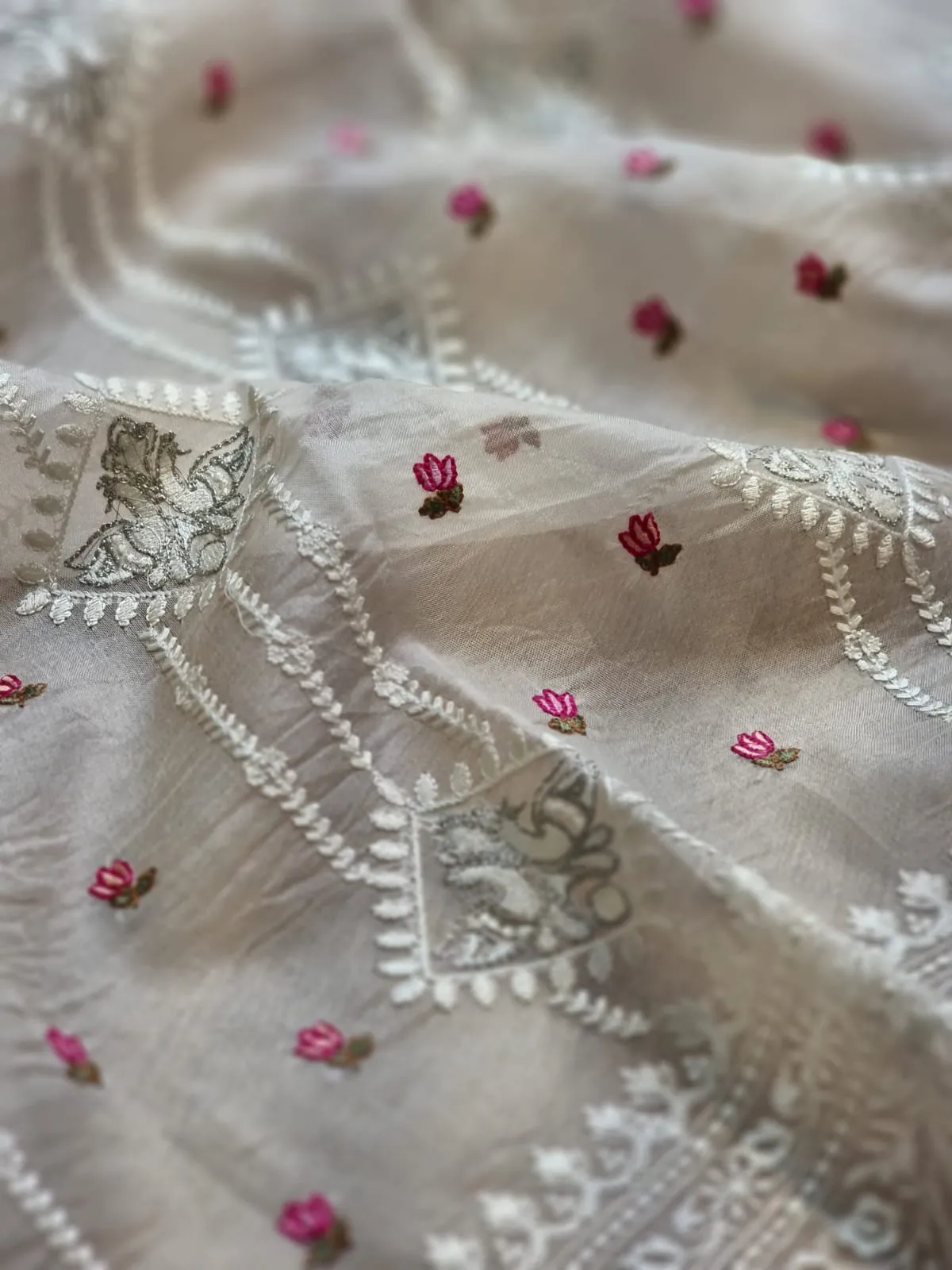 Embroidered white organza silk sarees