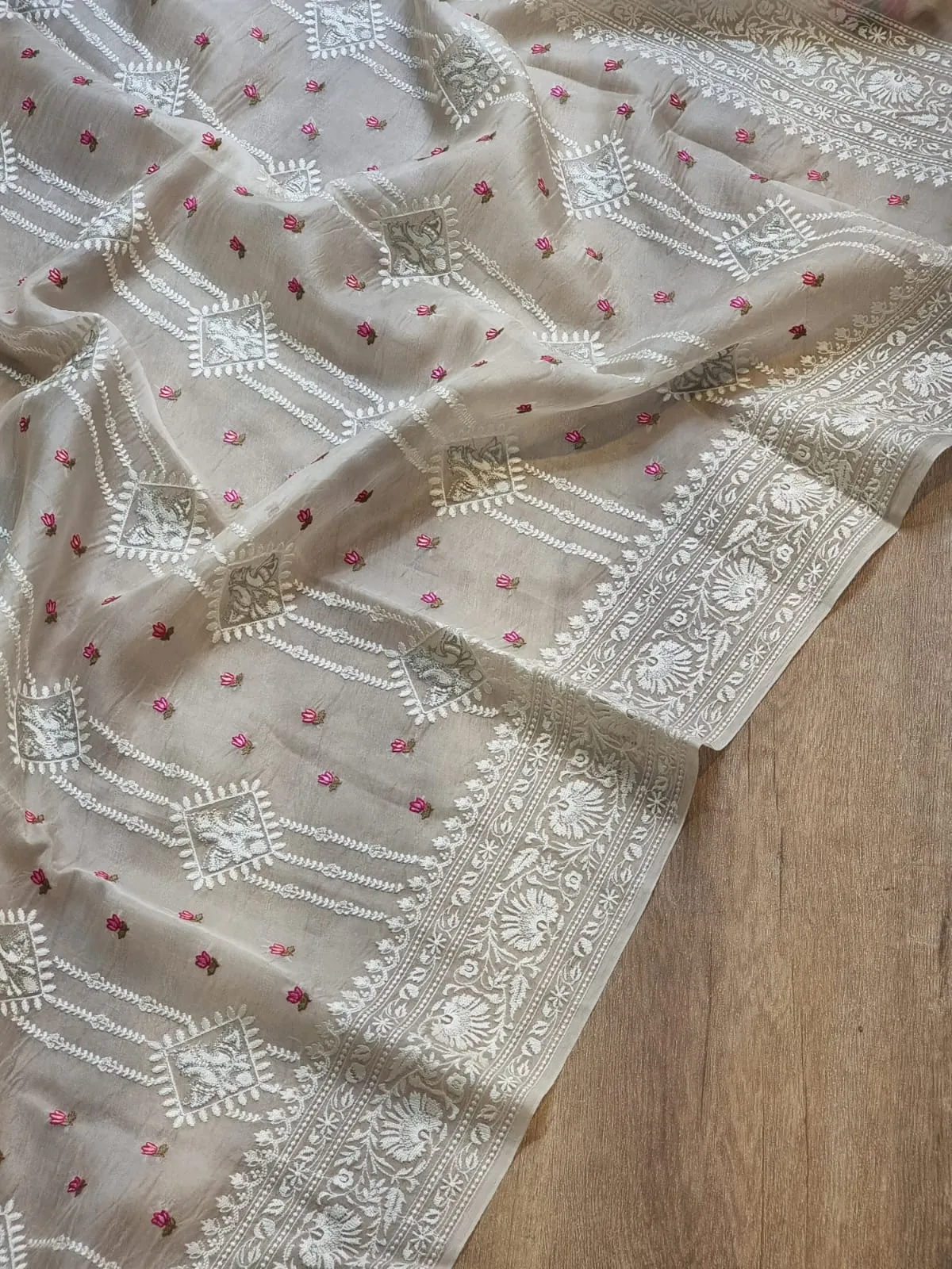 Embroidered white organza silk sarees