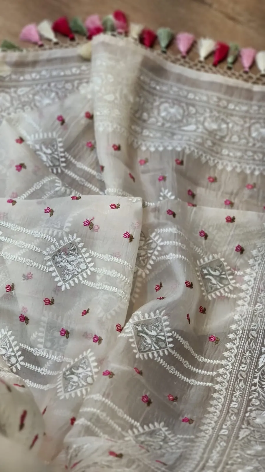 Embroidered white organza silk sarees