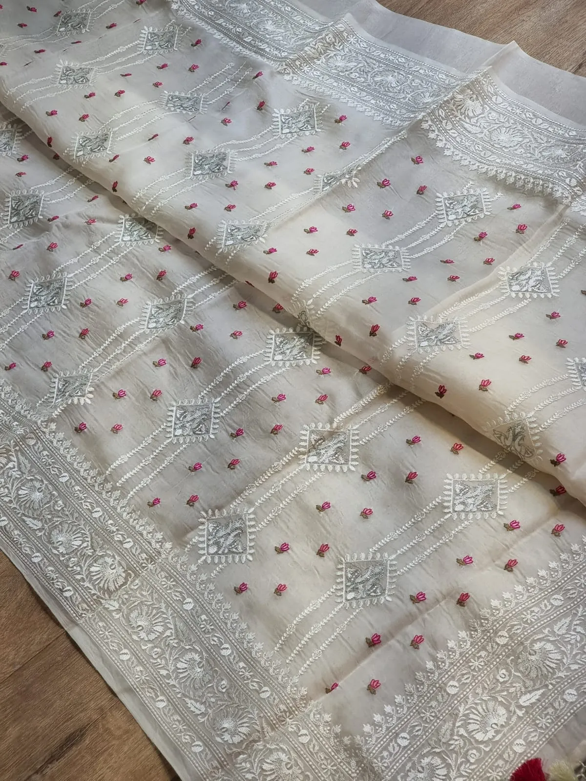 Embroidered white organza silk sarees